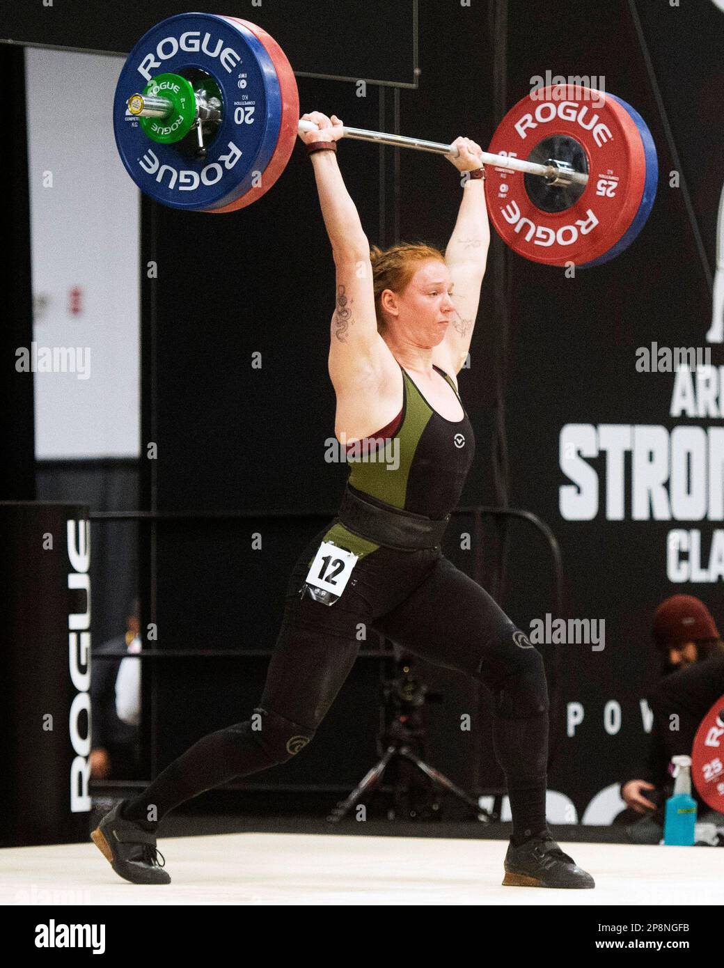 Columbus, Ohio, United States. 3th Mar, 2023. Halle Kotchman clean and jerks 112kgs in the Women's 71kg category at the Rogue Stage in Columbus, Ohio, USA. Credit: Brent Clark/Alamy Live News Stock Photo