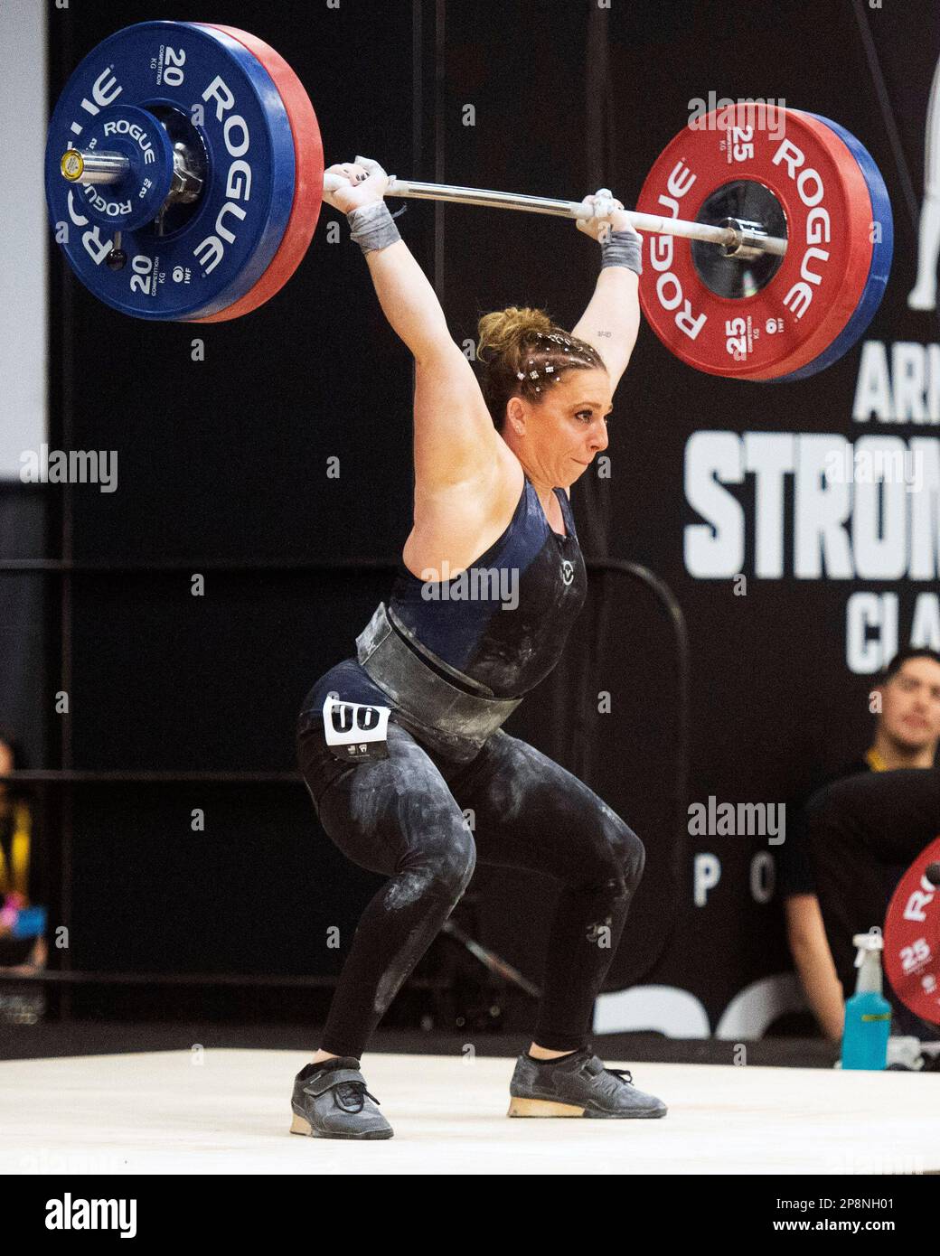 Columbus, Ohio, United States. 3th Mar, 2023. Shelby Pflug competes in the clean and jerk in the Women's 64kg category at the Rogue Stage in Columbus, Ohio, USA. Credit: Brent Clark/Alamy Live News Stock Photo