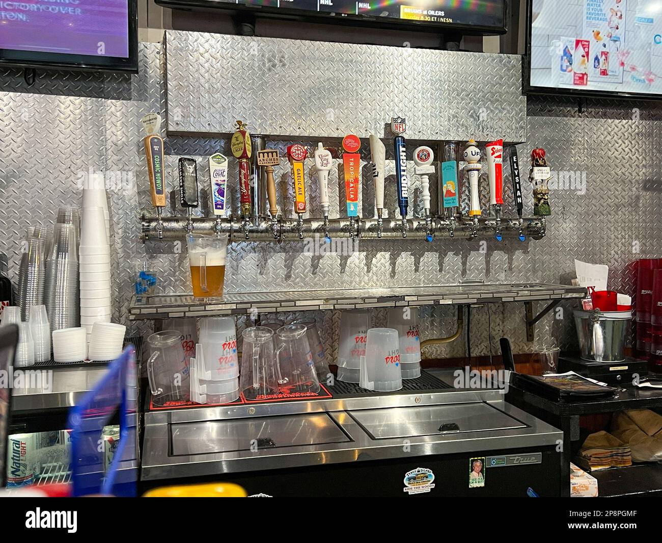 Savannah, GA USA February 26, 2023 Draft Beer tappers at Coaches