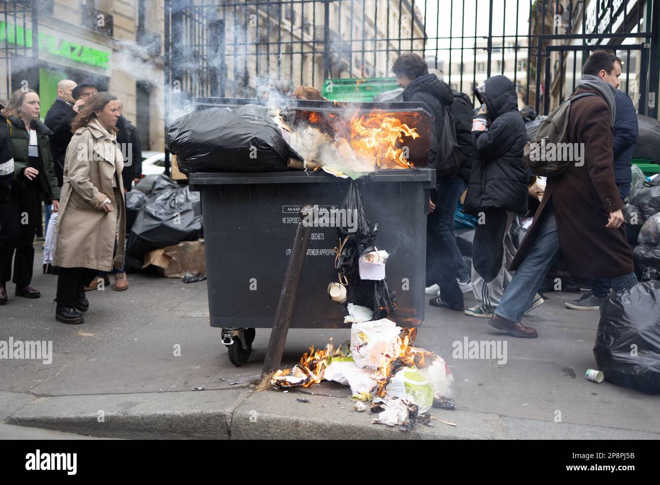 Paris, France, March 9, 2023. Burning trash as the garbage collector of