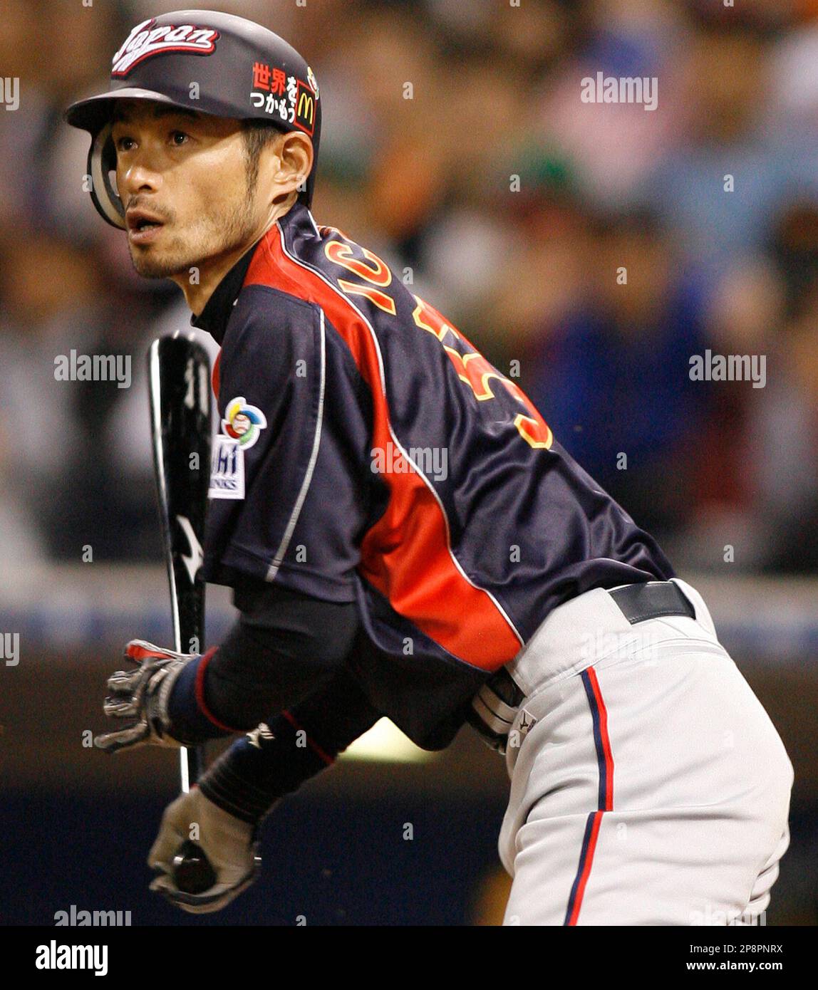 Japan's Ichiro Suzuki watches his ground ball out in the fifth inning