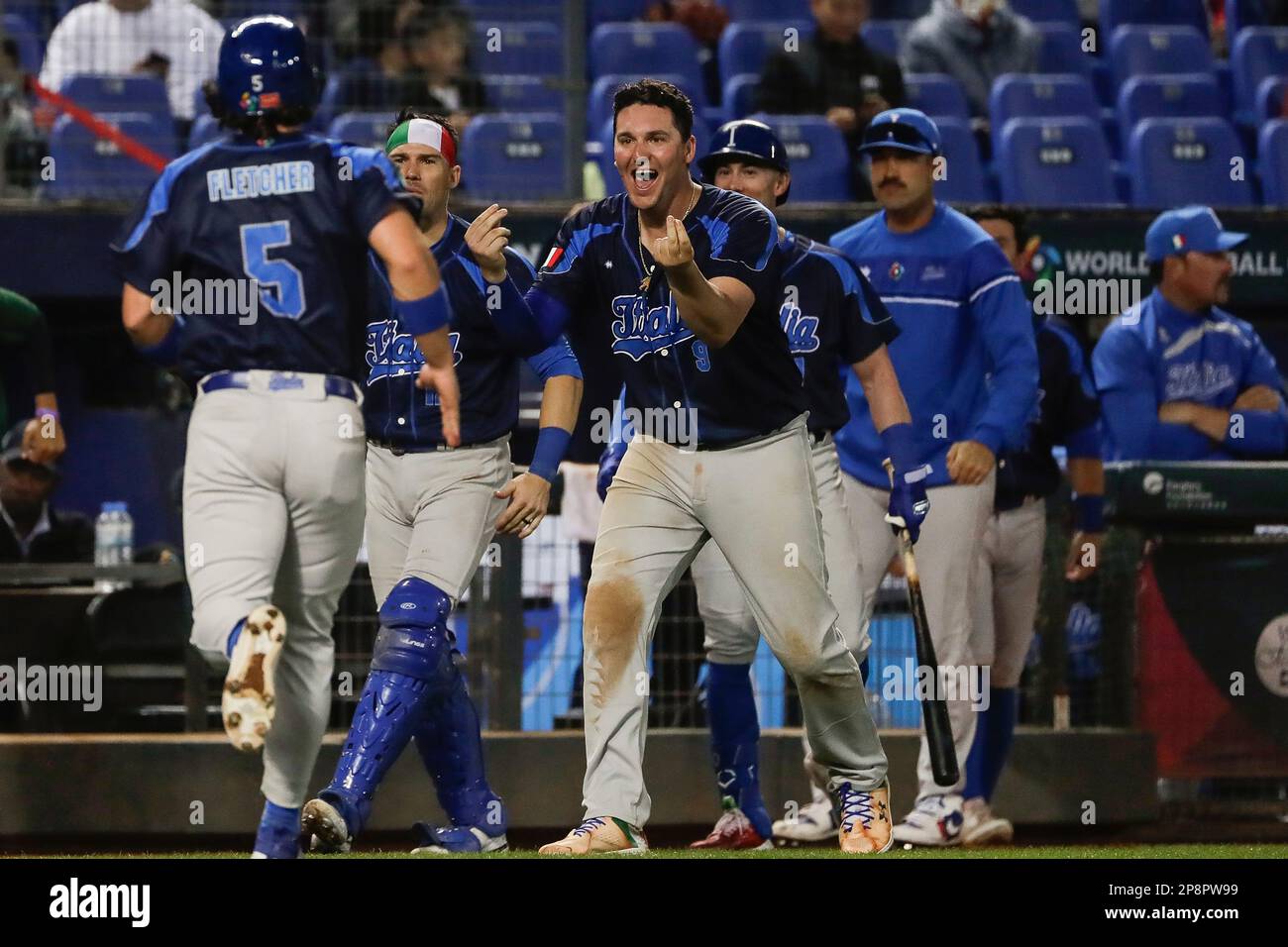 Italy's Vinnie Pasquantino gestures to cheer at his teammate Dominic  Fletcher at left during a Pool A game against Cuba for the World Baseball  Classic (WBC) at the Taichung Intercontinental Baseball Stadium