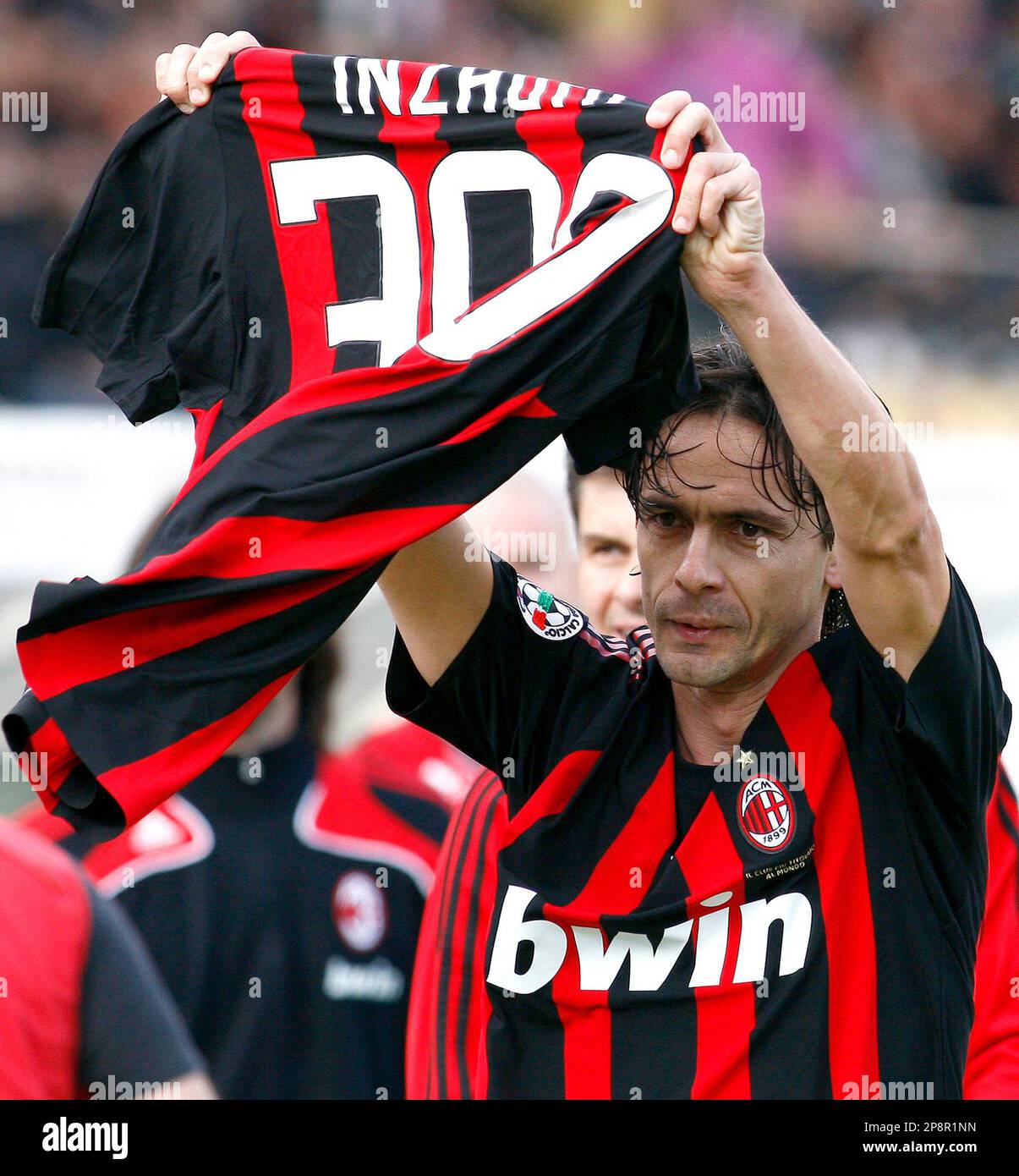 AC Milan striker Filippo Inzaghi shows a special jersey with number 300, as he celebrates after scoring his 300th goal in his career, during a Serie A soccer match between Siena and AC Milan striker Filippo Inzaghi shows a special jersey with number 300, as he celebrates after scoring his 300th goal in his career, during a Serie A soccer match between Siena and