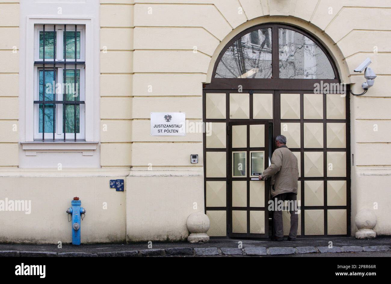 Windowless Penitentiary An man walks into the prison in St. Poelten, Austria, where Josef ...