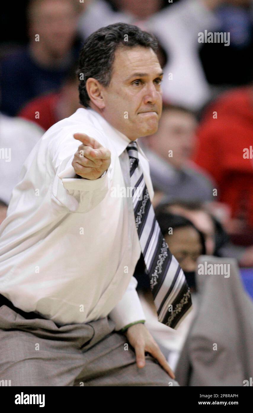 Akron coach Keith Dambrot directs his team in the second half of an ...