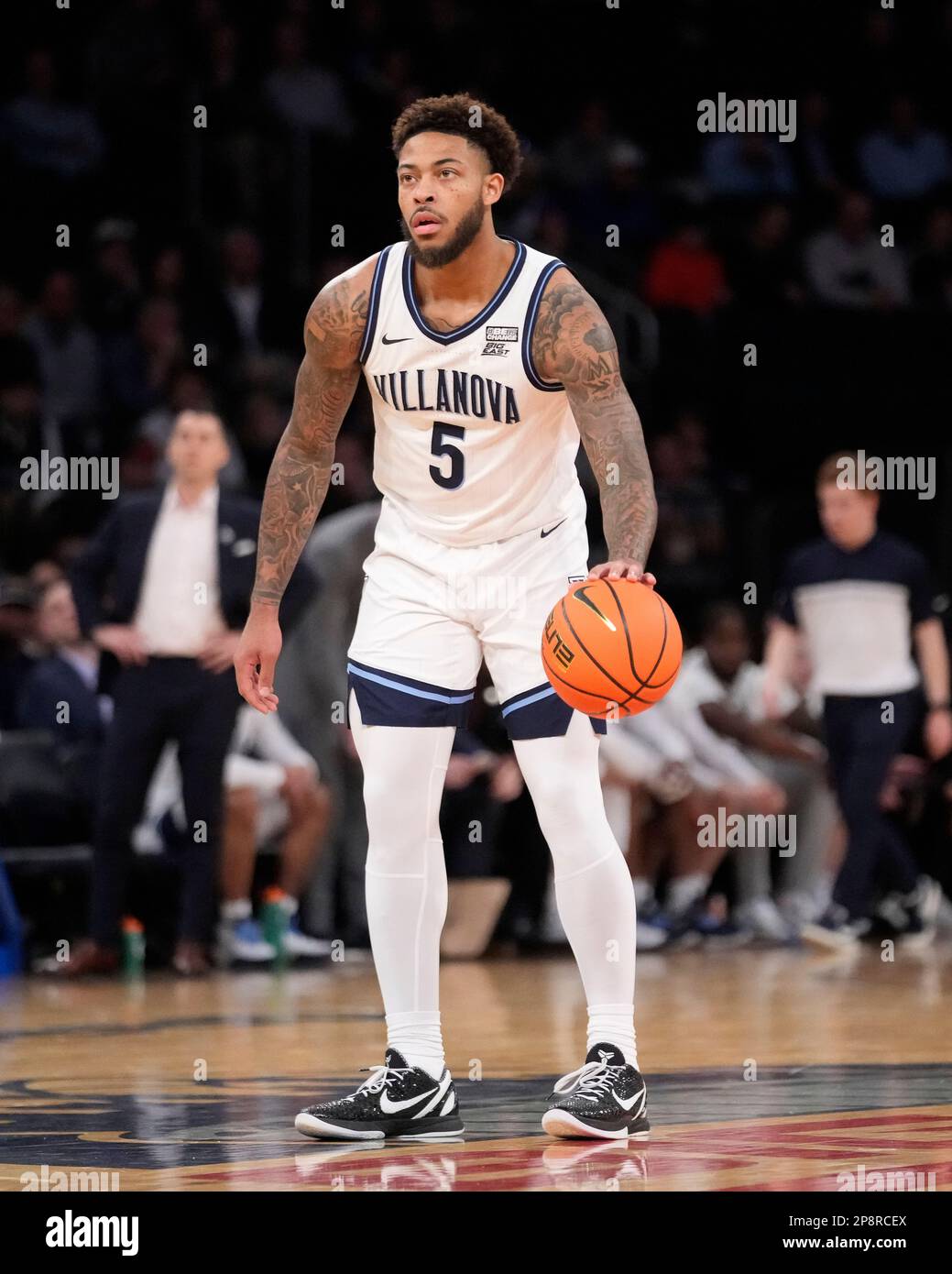 Villanova's Justin Moore (5) sets up a play in the first half of an