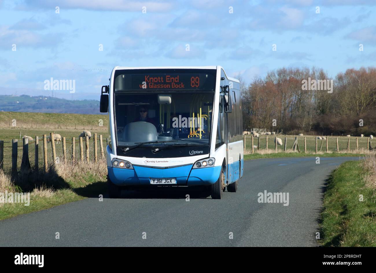 Kirkby Lonsdale coaches Optare Solo SR minibus/midibus YJ61 JGX in countryside on Lancaster to Knott End service 89 on 7th March 2023. Stock Photo