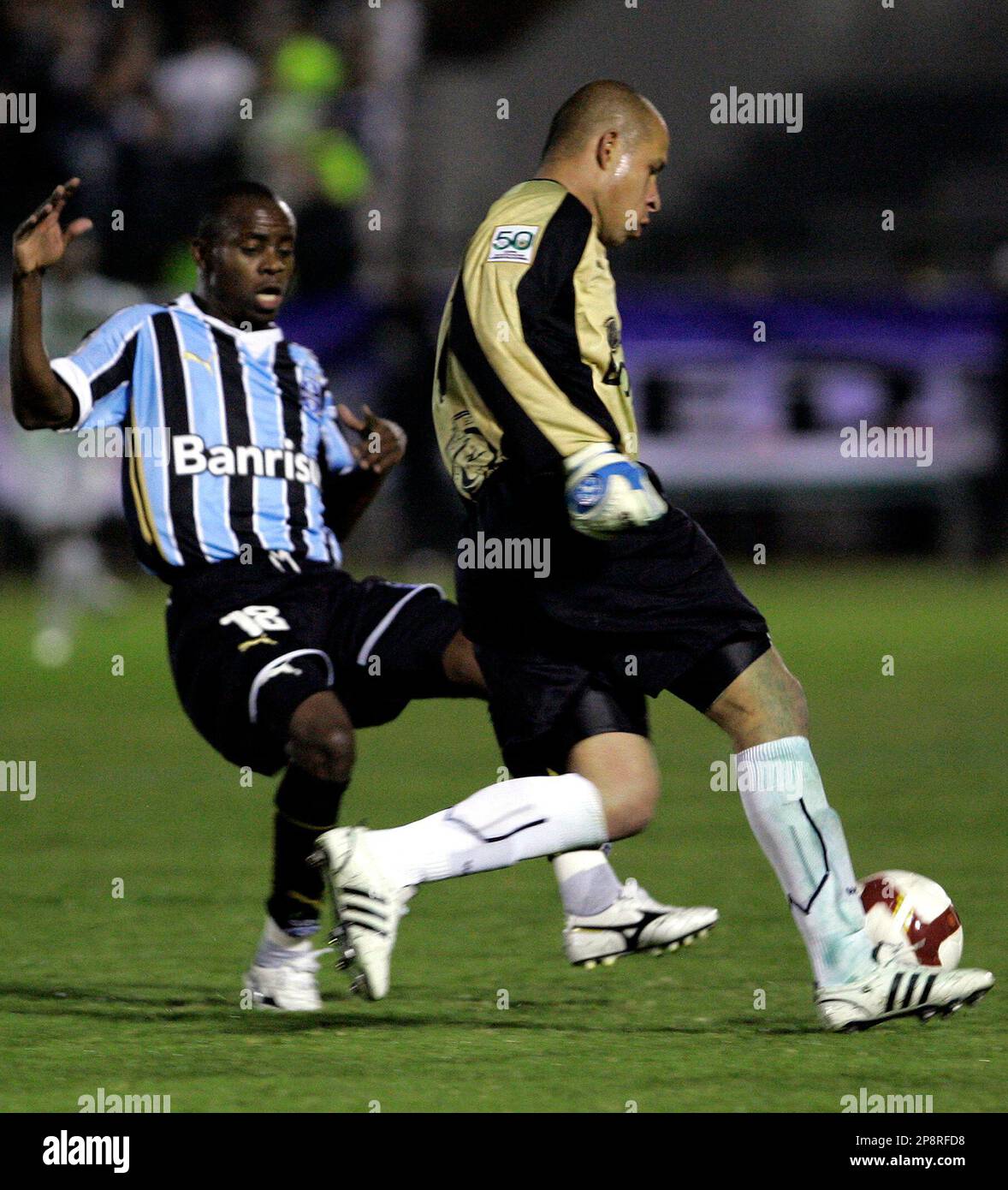 Colombia s Boyaca Chico FC s goalkeeper Edigson Velasquez right