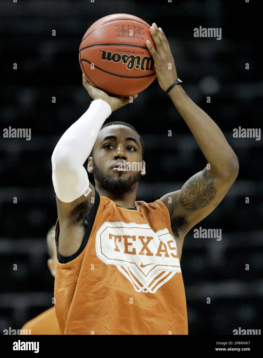 Texas' A.J. Abrams (3) takes a shot during an NCAA college basketball