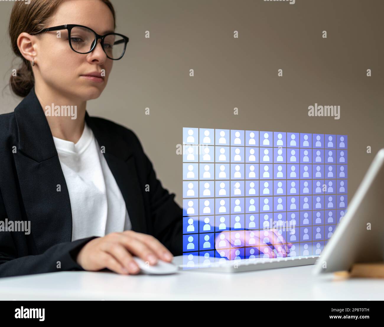 Human resource manager works with digital employee database. Stock Photo