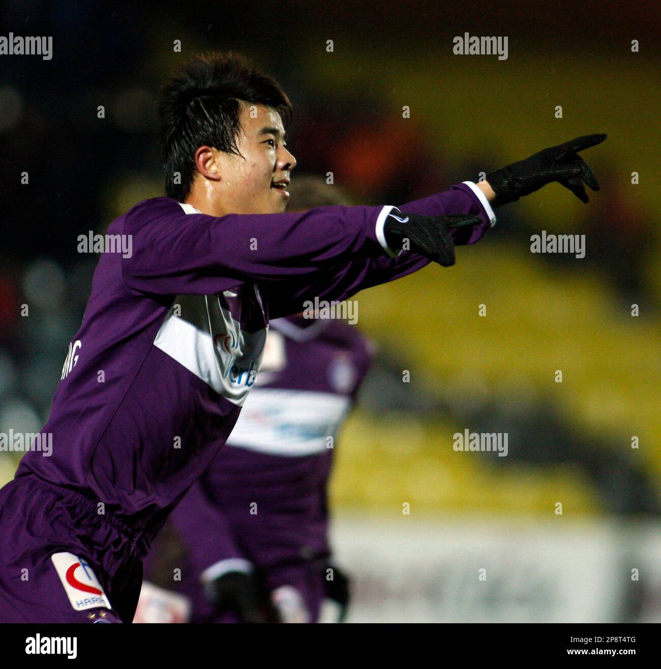 Xiang Sun from FK Austria Wien celebrates scoring during the Austrian  soccer league match FK Austria Wien against LASK Linz in Vienna, Austria,  on Saturday, March 7, 2009. (AP Photo/Ronald Zak Stock