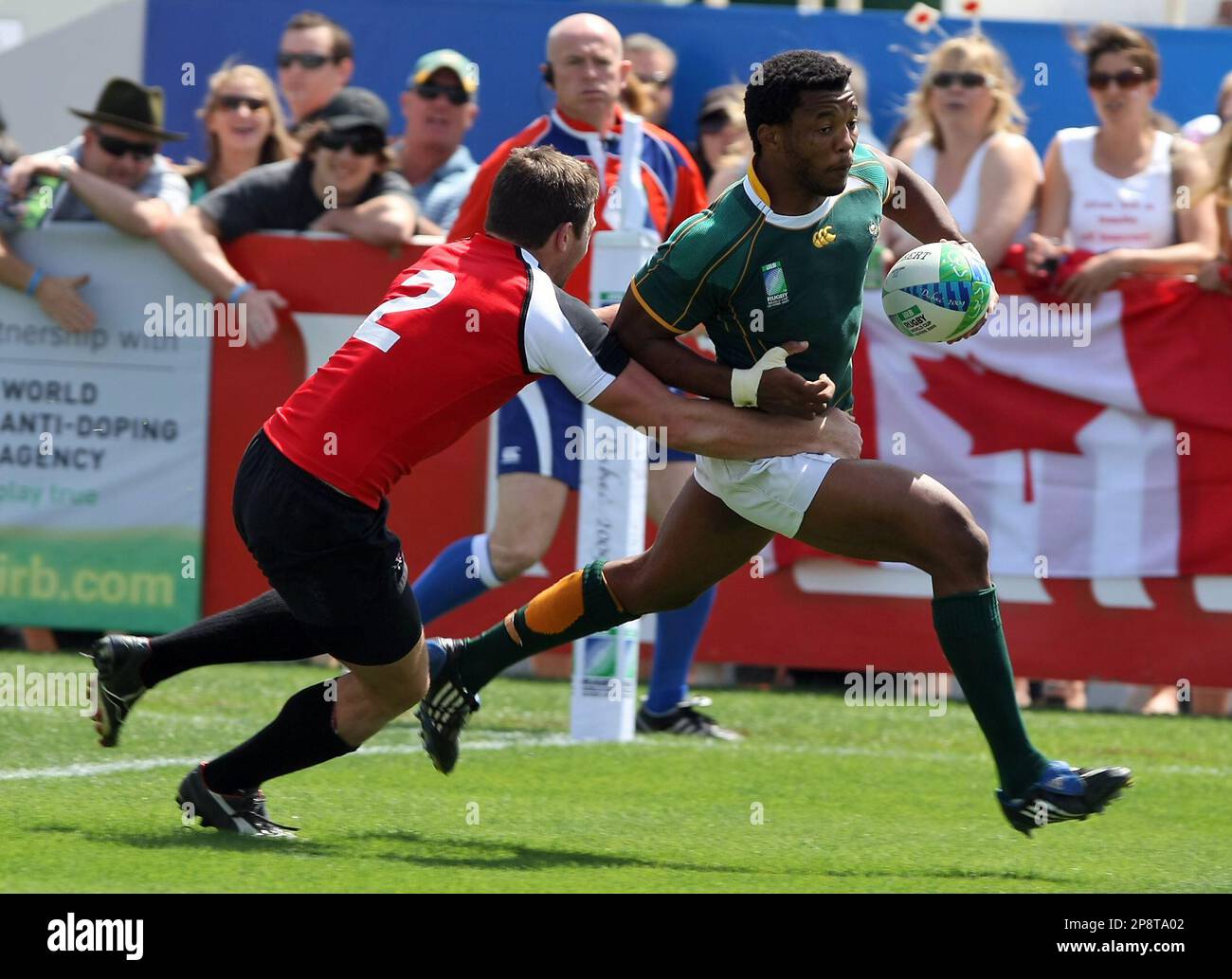 South Africa's Mpho Mbiyozo runs in for a try against Canada during the