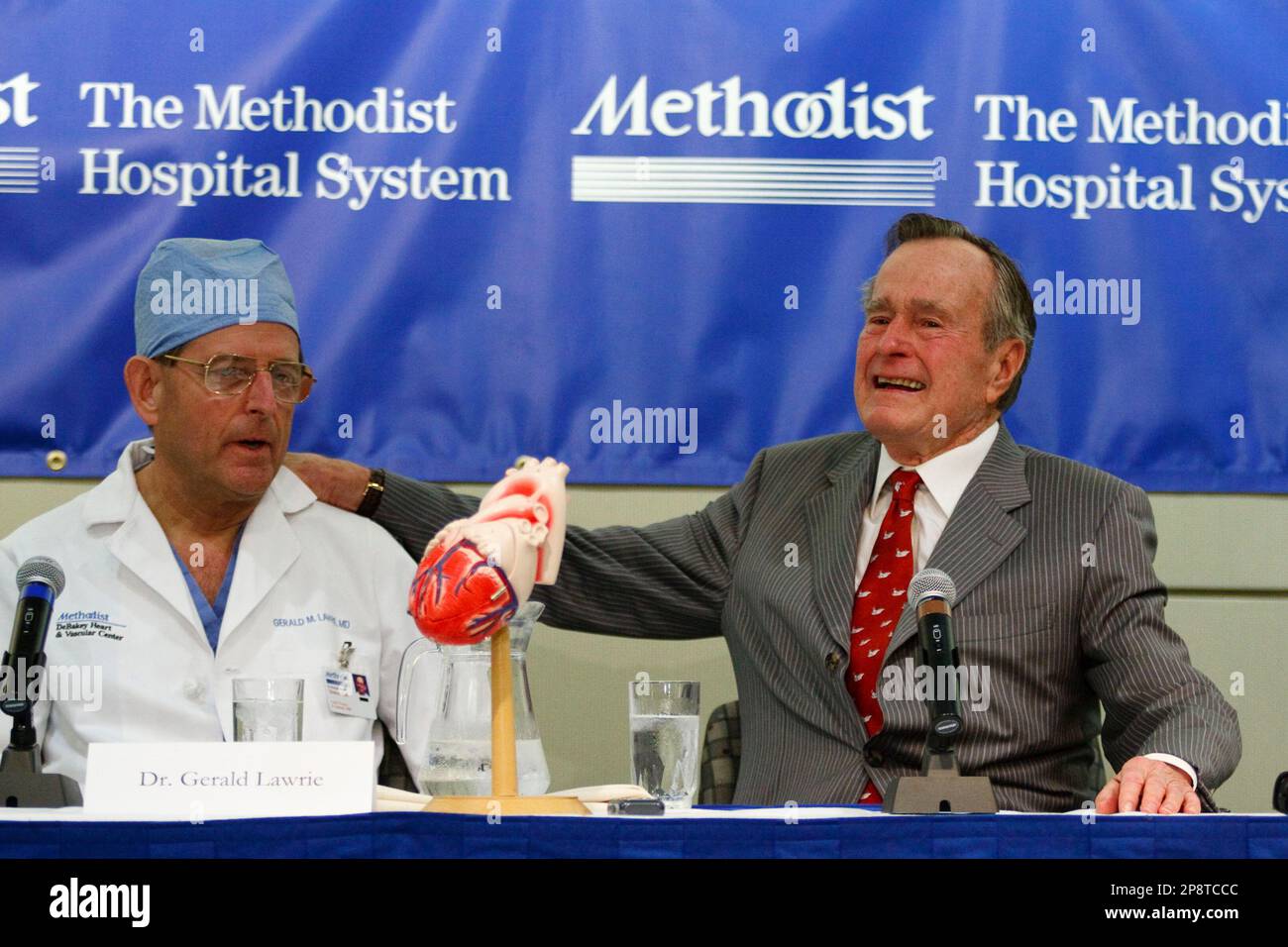 Former President George H W Bush speaks with Heart Surgeon Dr 