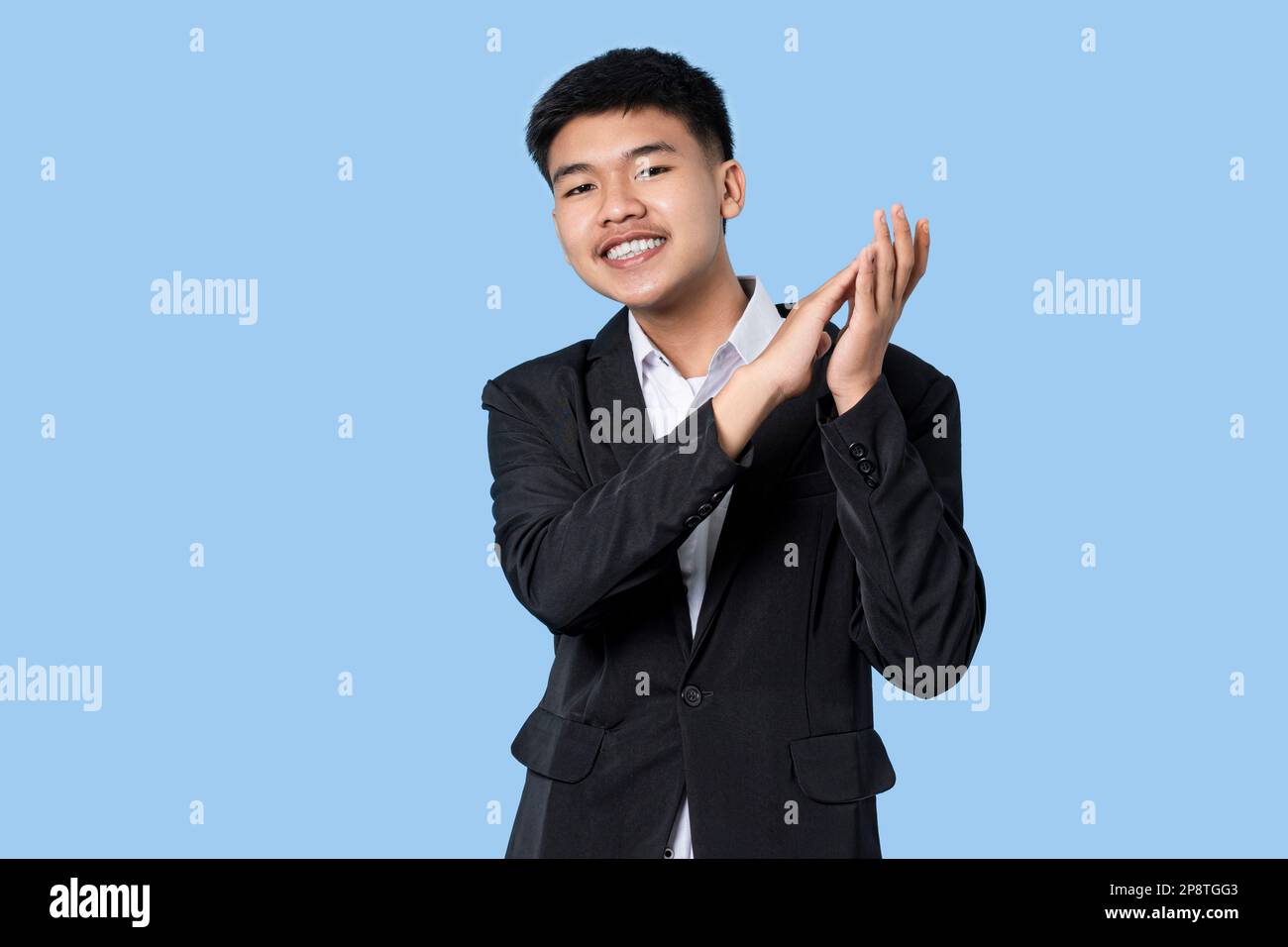 Uniform clapping smiling hi-res stock photography and images - Alamy