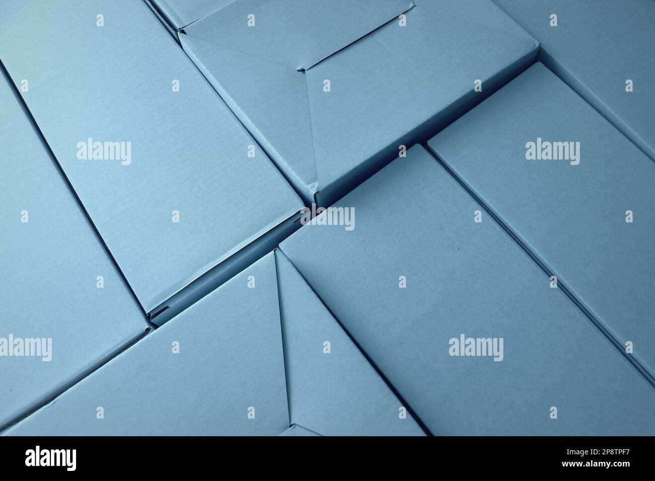 Cardboard boxes seamless pattern on blue background Stock Photo
