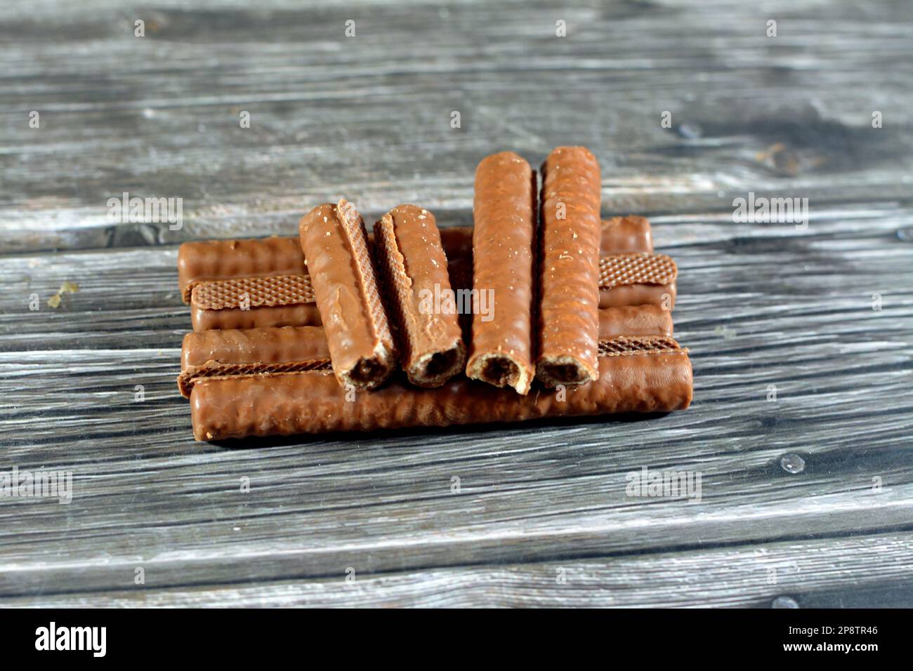 A creamy chocolate bars that has a velvety chocolate filling inside a wafer biscuit, biscuits covered and stuffed with chocolate spread, selective foc Stock Photo