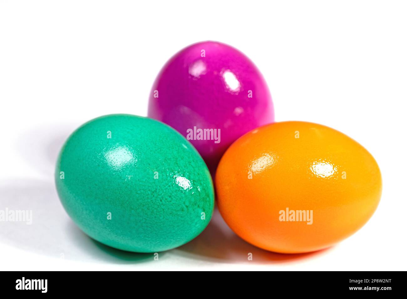 Colorful easter eggs against white background Stock Photo