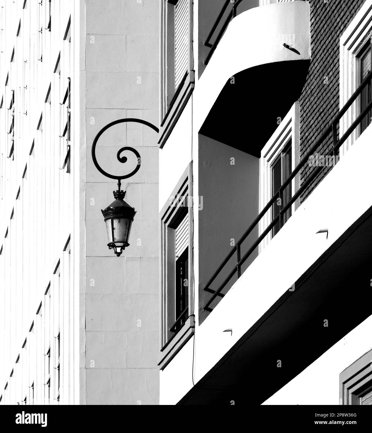 Shot in black and white detail on the facade of this historic building representing some character, animal or flower. Set at León, Castilla y León, Stock Photo