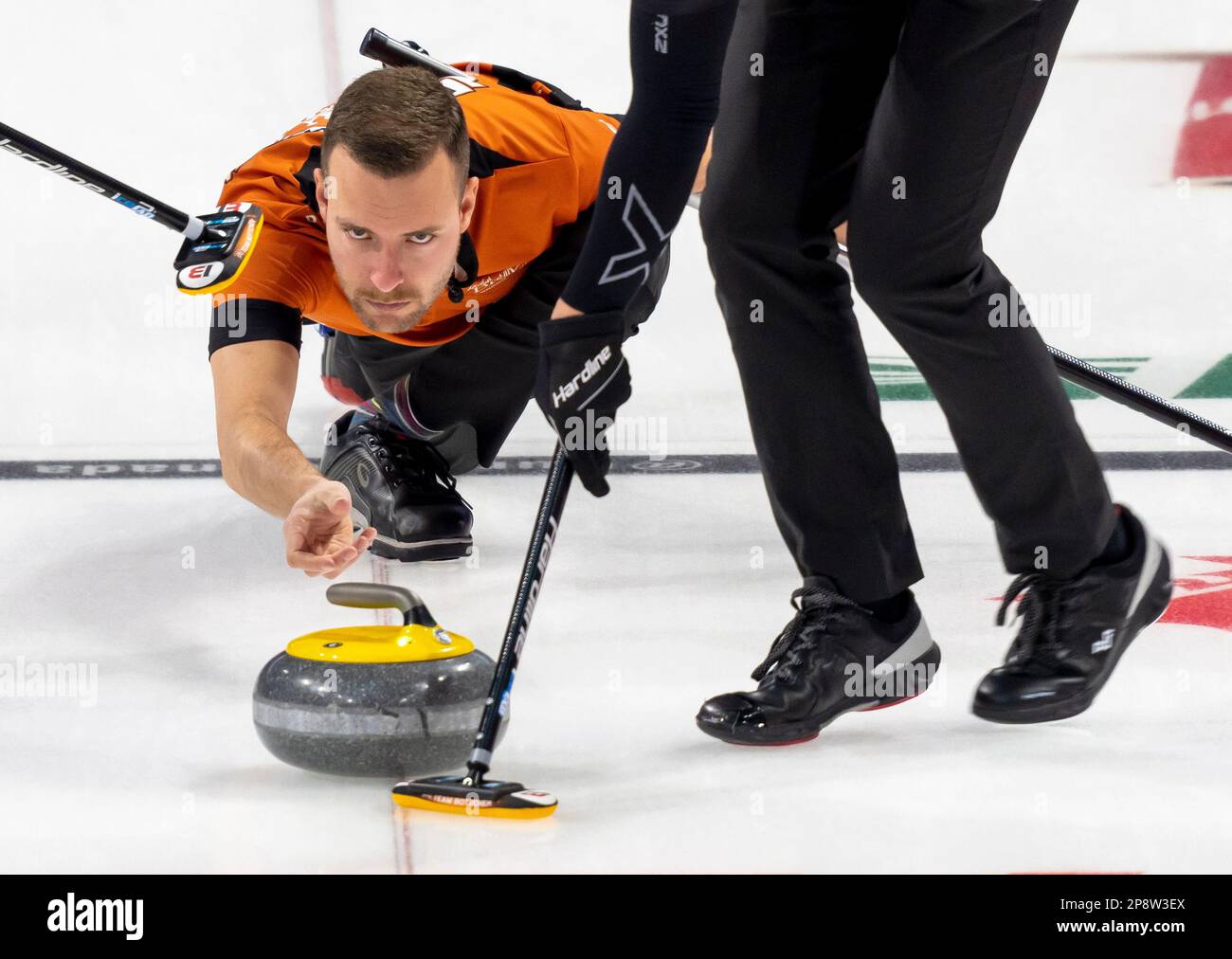 Team Wild Card 1 skip Brendan Bottcher delivers a shot during his teams win over Team Quebec at the 2023 Tim Hortons Brier mens curling championships in London, Ontario, Thursday March 9,