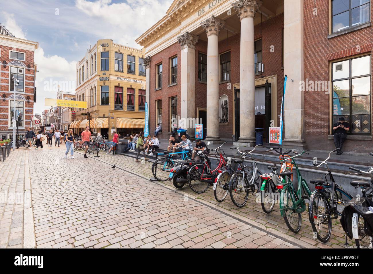 Busy, cozy street with many students in the center of the student city