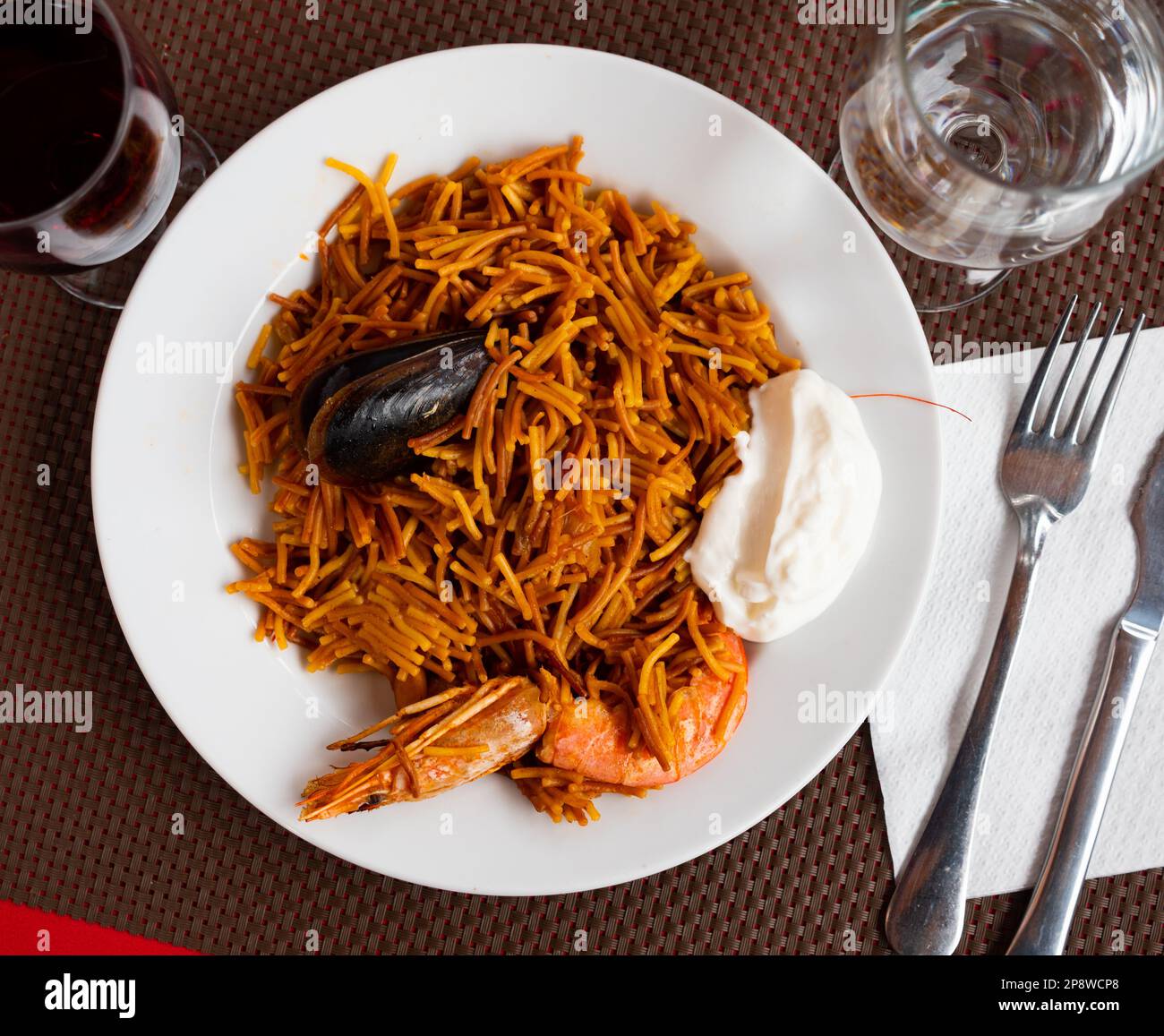 Dish of Valencian cuisine Fideua with seafood and noodles Stock Photo