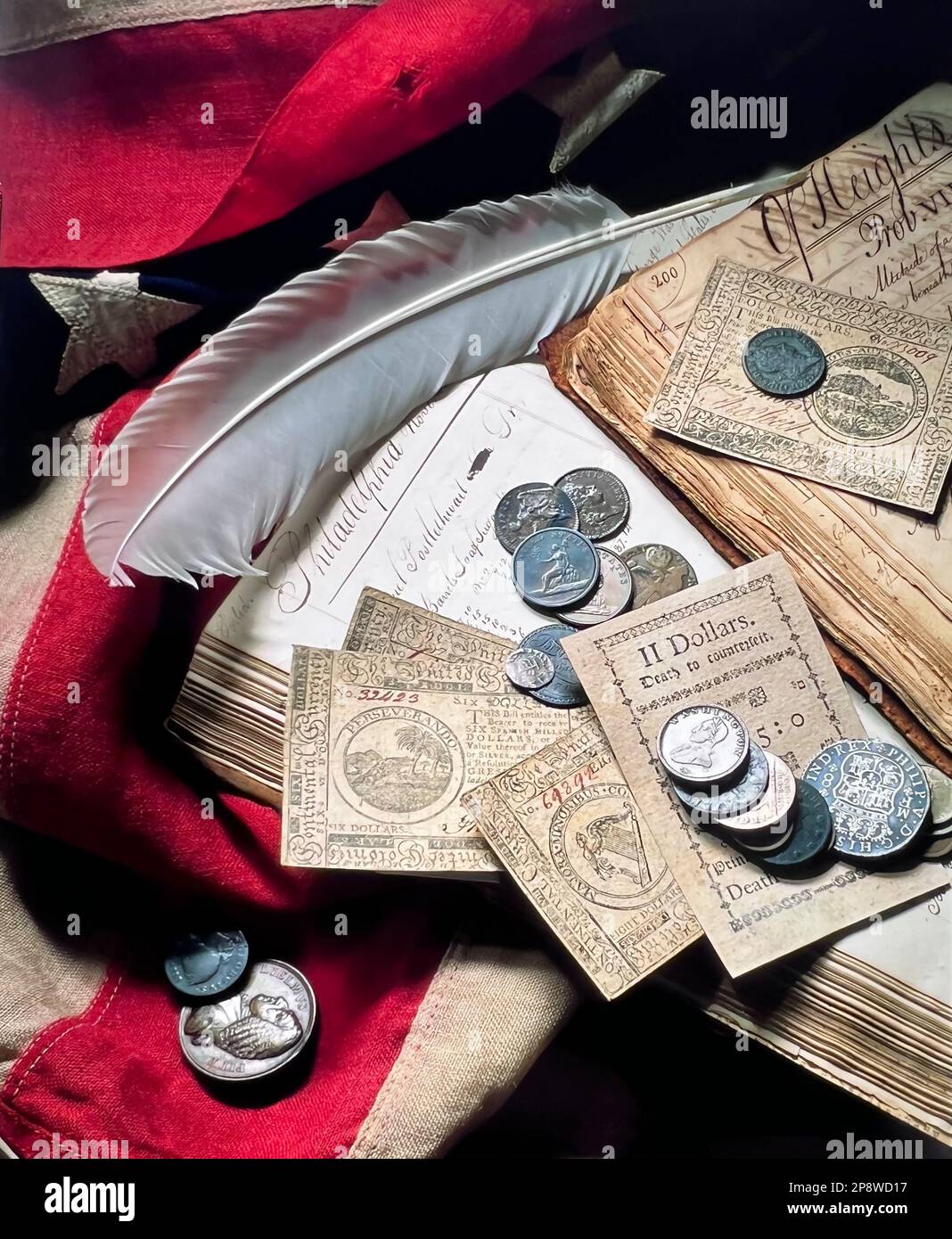 Still Iife photograph of colonial American coins and bank notes Stock Photo