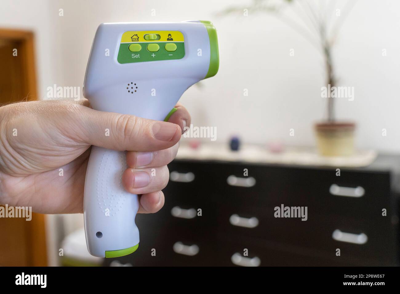 Measuring temperature with an electric thermometer Stock Photo Alamy