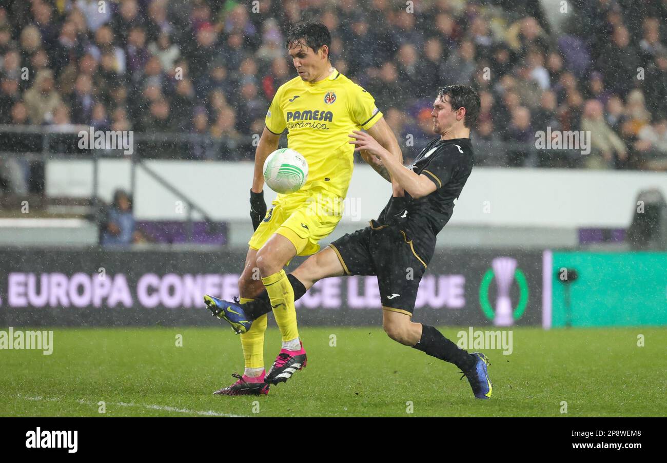 Anderlecht, Brussels, 09 March 2023. Villarreal's Aissa Mandi and Anderlecht's Benito Raman fight for the ball during the match between Belgian soccer team RSC Anderlecht and Spanish Villarreal CF, the first leg of the round of 16 of the UEFA Europa Conference League competition, in Anderlecht, Brussels, Thursday 09 March 2023. BELGA PHOTO VIRGINIE LEFOUR Stock Photo