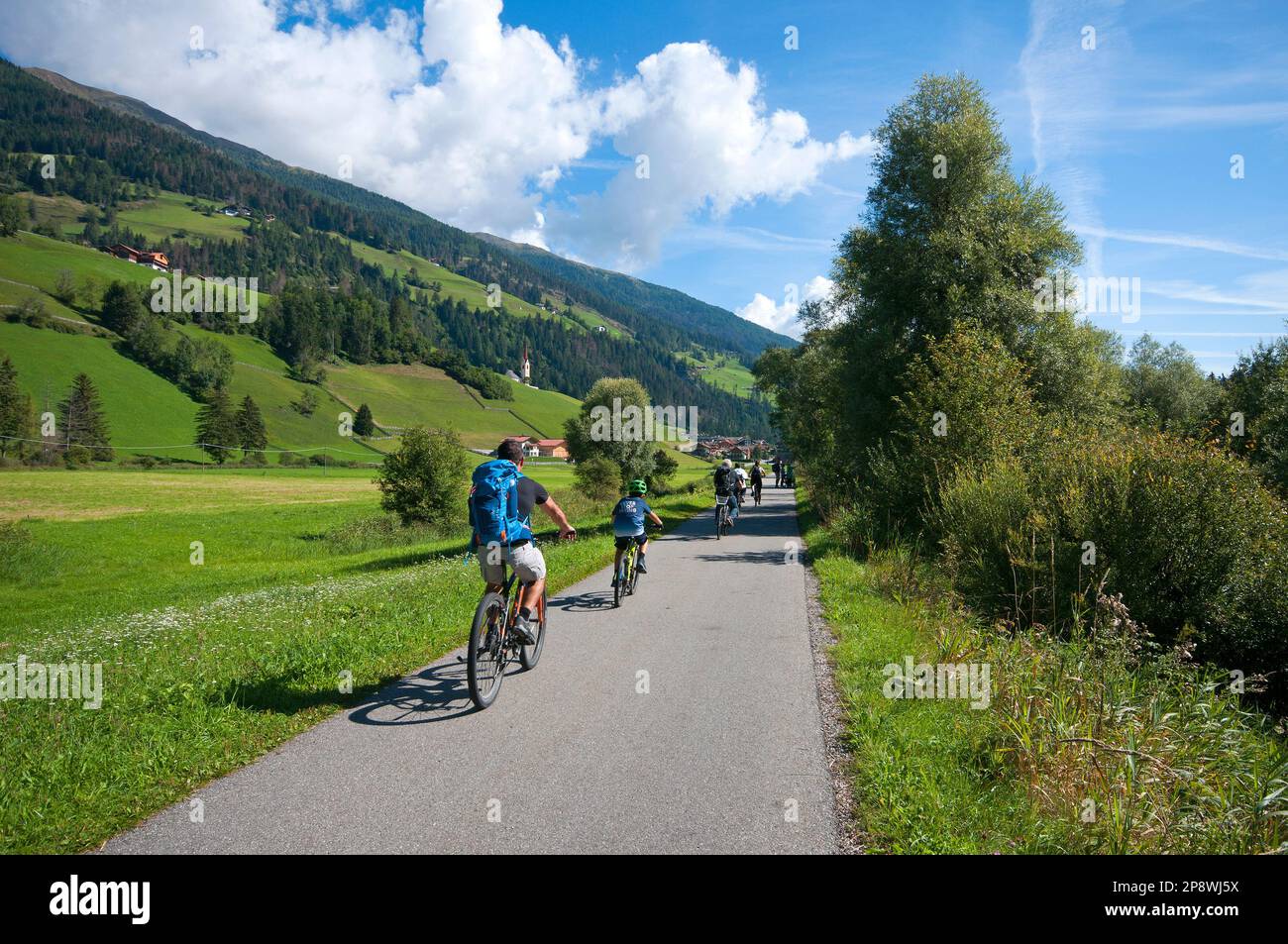Biking along the cycle path between San Candido (Innichen) and Lienz, East Tyrol, Austria Stock Photo