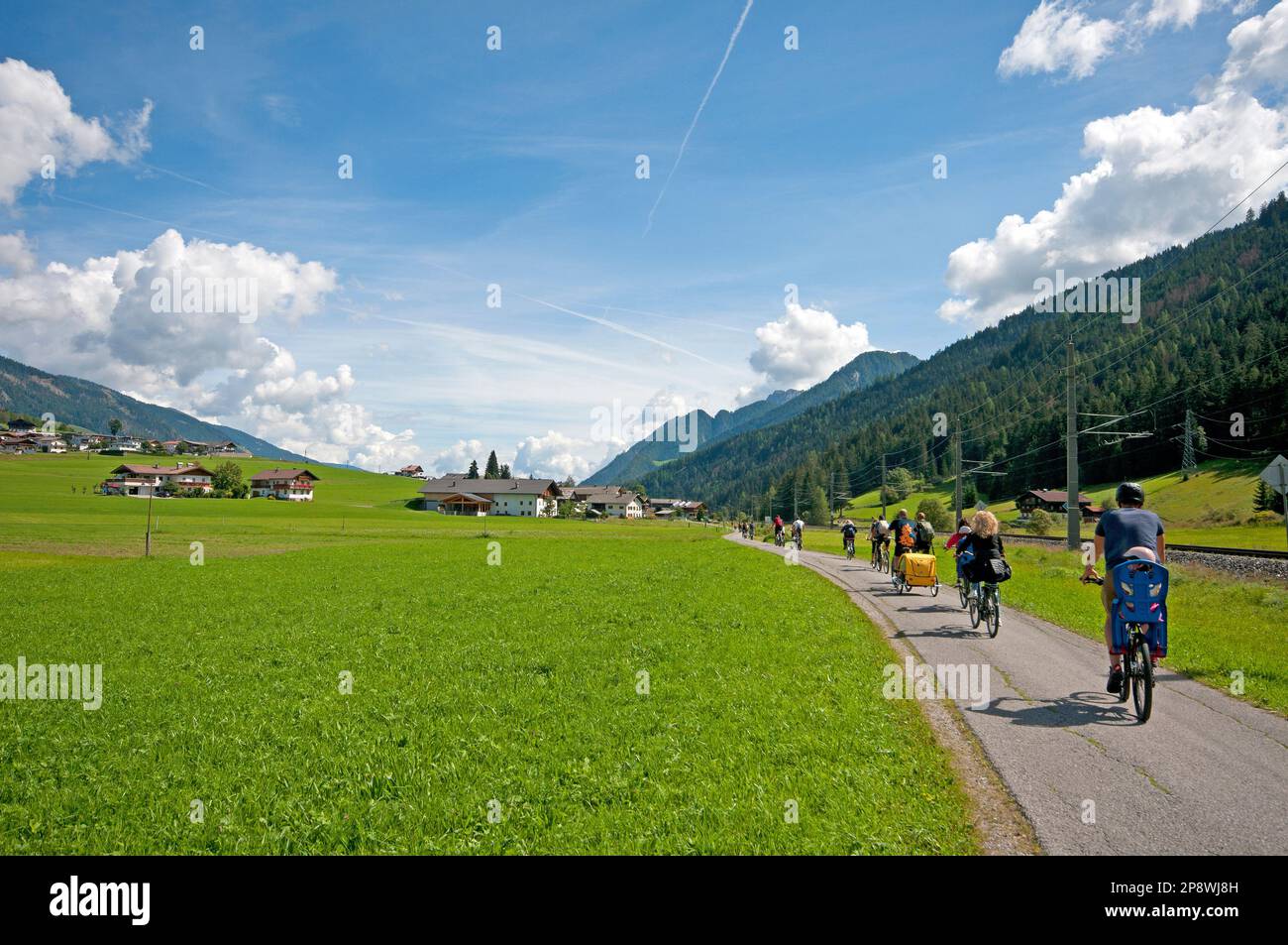 Biking along the cycle path between San Candido (Innichen) and Lienz, East Tyrol, Austria Stock Photo