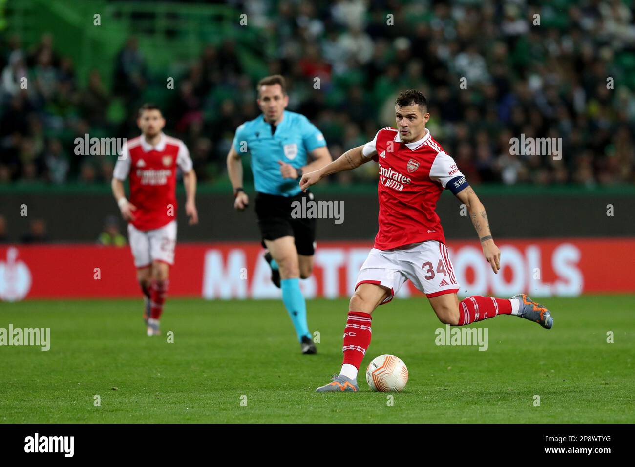 Lisbon, Portugal. 9th Mar, 2023. Granit Xhaka of Arsenal FC shoots to score during the UEFA Europa League round of 16 leg one football match between Sporting CP and Arsenal FC at Alvalade stadium in Lisbon, Portugal, on March 9, 2023. (Credit Image: © Pedro Fiuza/ZUMA Press Wire) EDITORIAL USAGE ONLY! Not for Commercial USAGE! Stock Photo