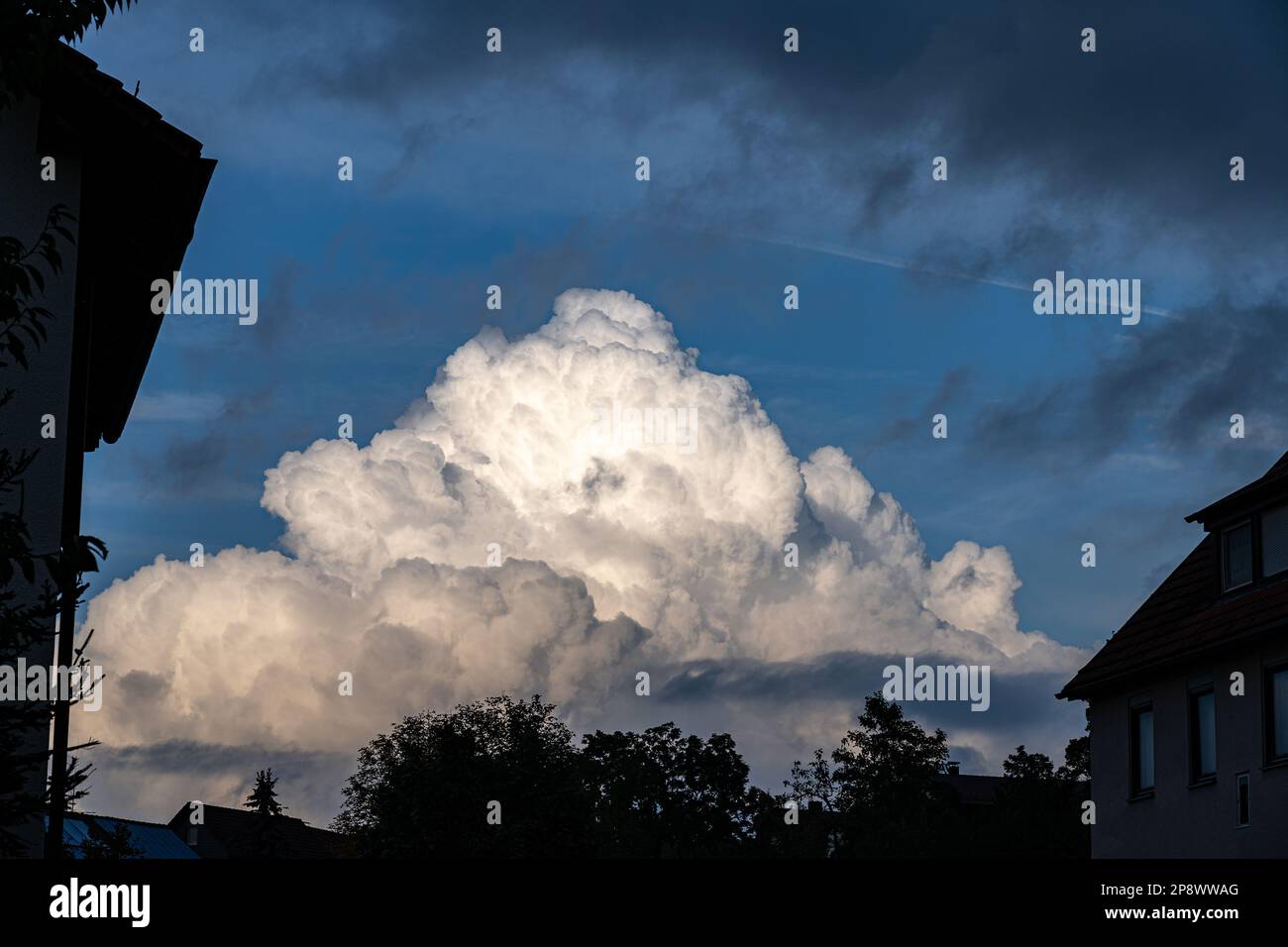 Huge white cloud on the blue sky Stock Photo