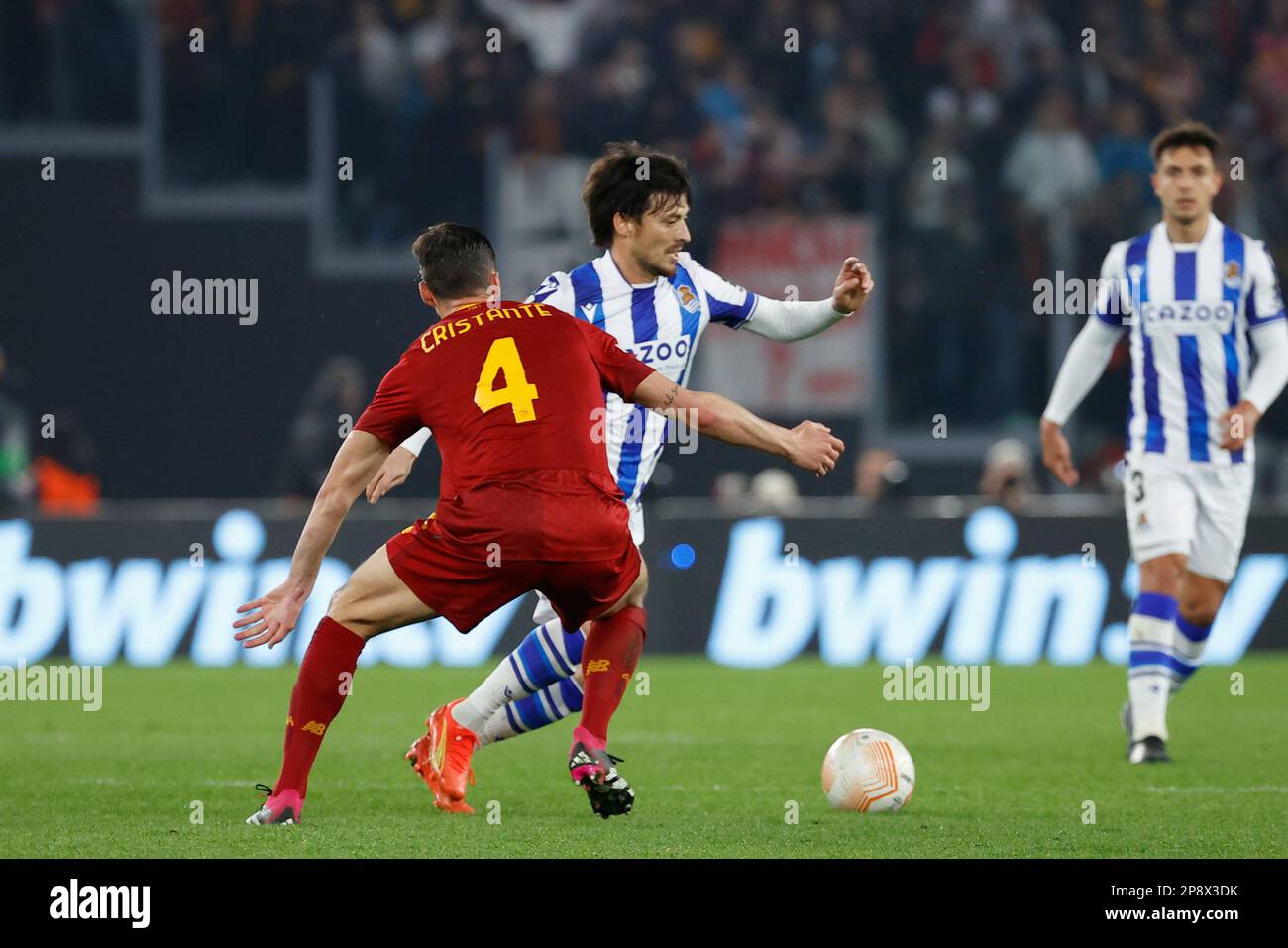 Stadio Olimpico, Rome, Italy. 9th Mar, 2023. Europa League Football, Round of 16 1st Leg; Roma versus Real Sociedad; David Silva of Real Sociedad takes on Bryan Cristante of AS Roma Credit: Action Plus Sports/Alamy Live News Stock Photo