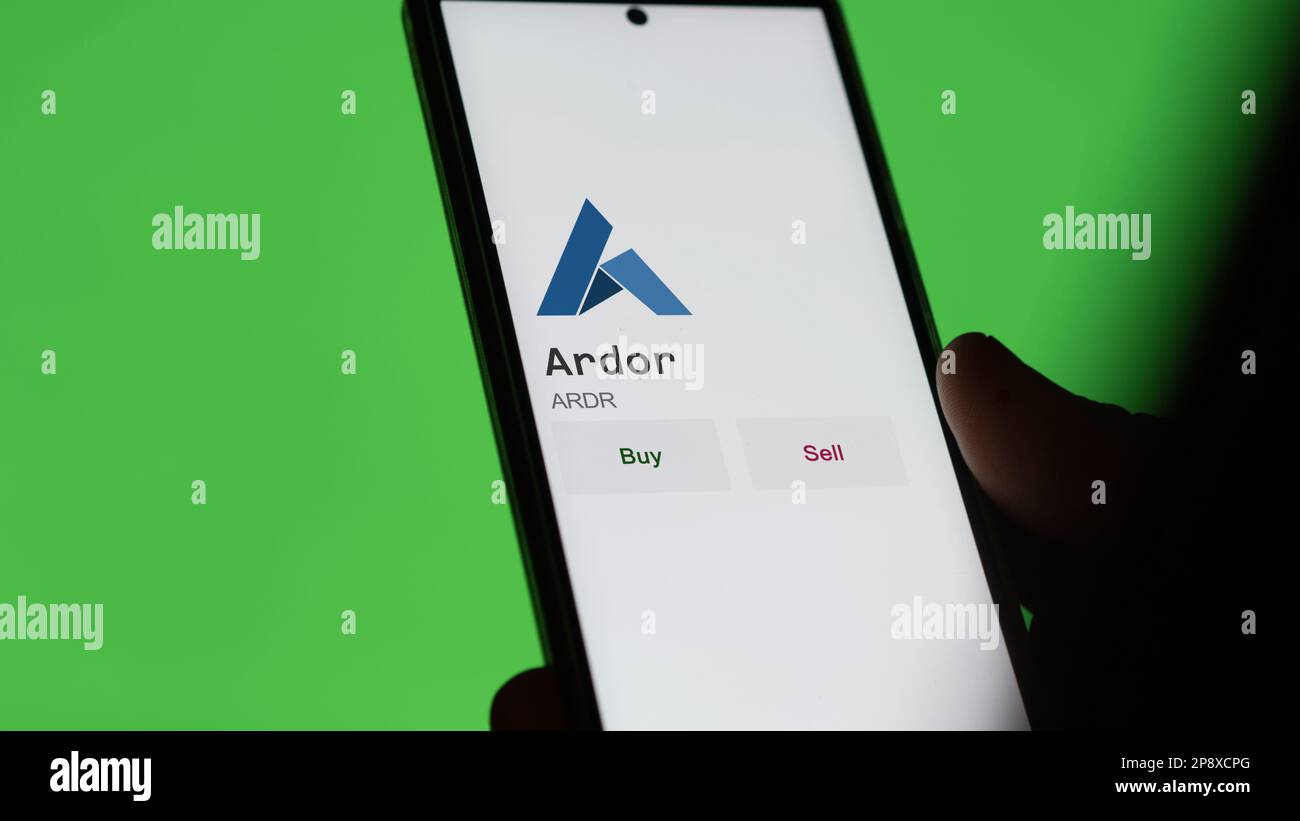 An investor's analyzing the Ardor ARDR coin on screen. A phone shows the  crypto's prices to invest in ardor token Stock Photo - Alamy