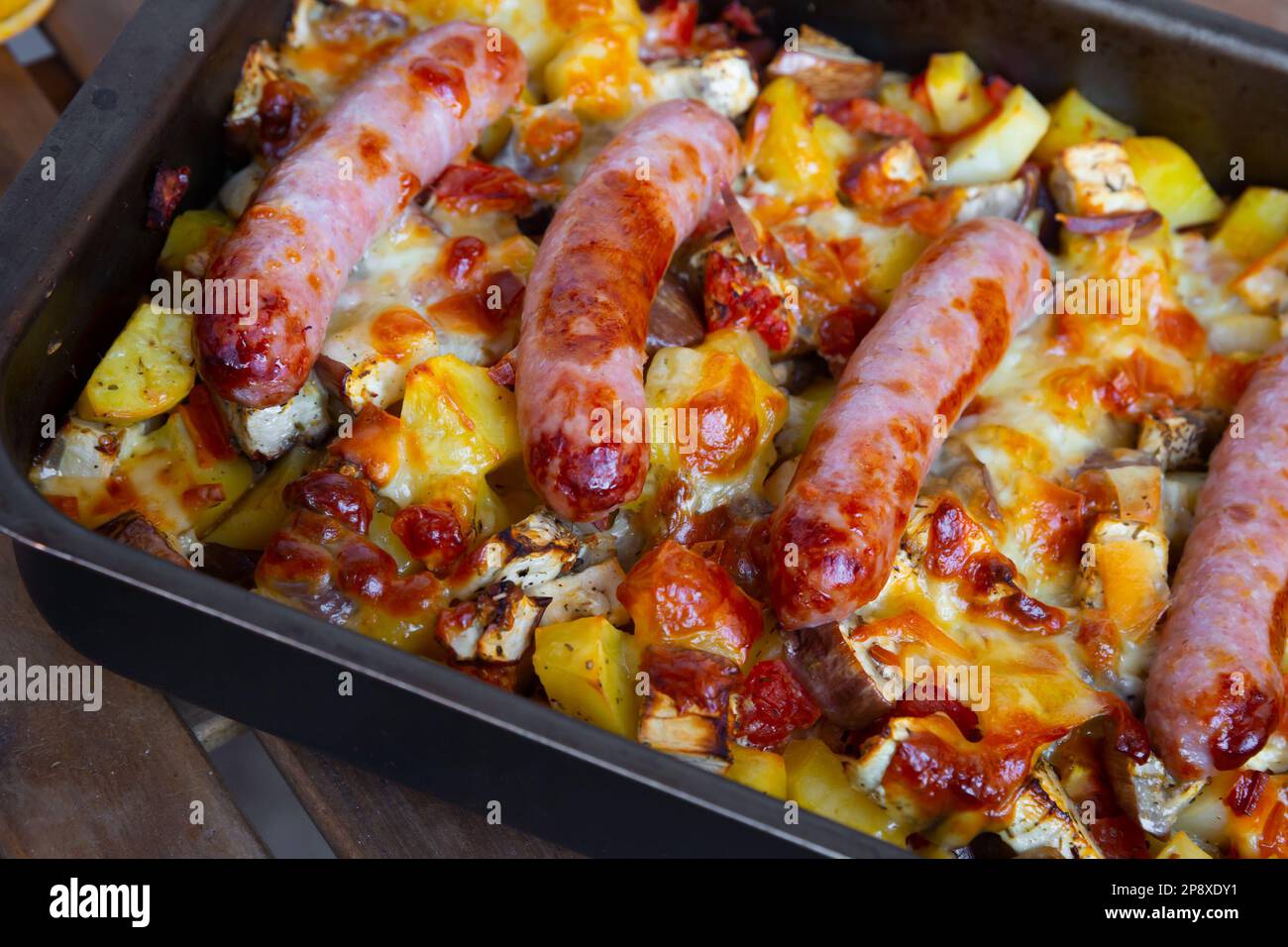 Baked vegetables with sausages Stock Photo Alamy