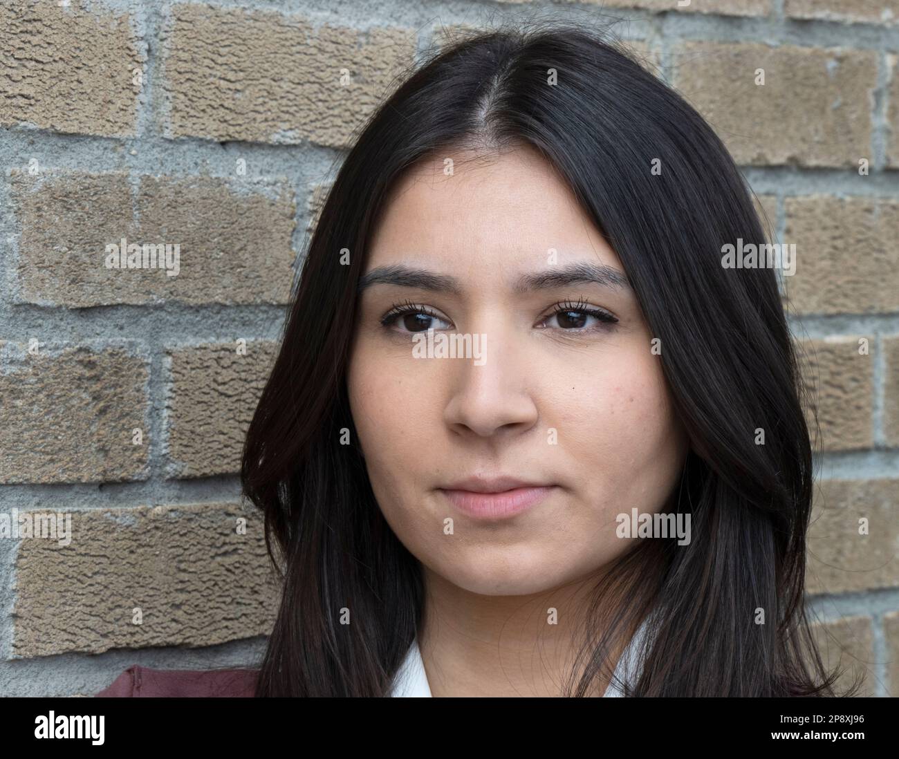 Miriam Ikhlef poses for a photo Thursday, March 9, 2023 in Montreal. Ikhlef  was fired from the 911 call centre and had her application denied to become  a Montreal police officer for