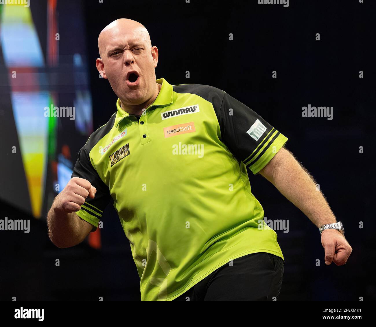 Michael van Gerwen celebrates winning the match during the 2023 Cazoo