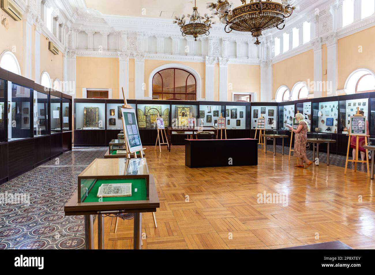 Kutaisi, Georgia, 04.06.21. Niko Berdzenishvili Kutaisi State History Museum, main exhibition room with glass old-style showcases in classical buildin Stock Photo