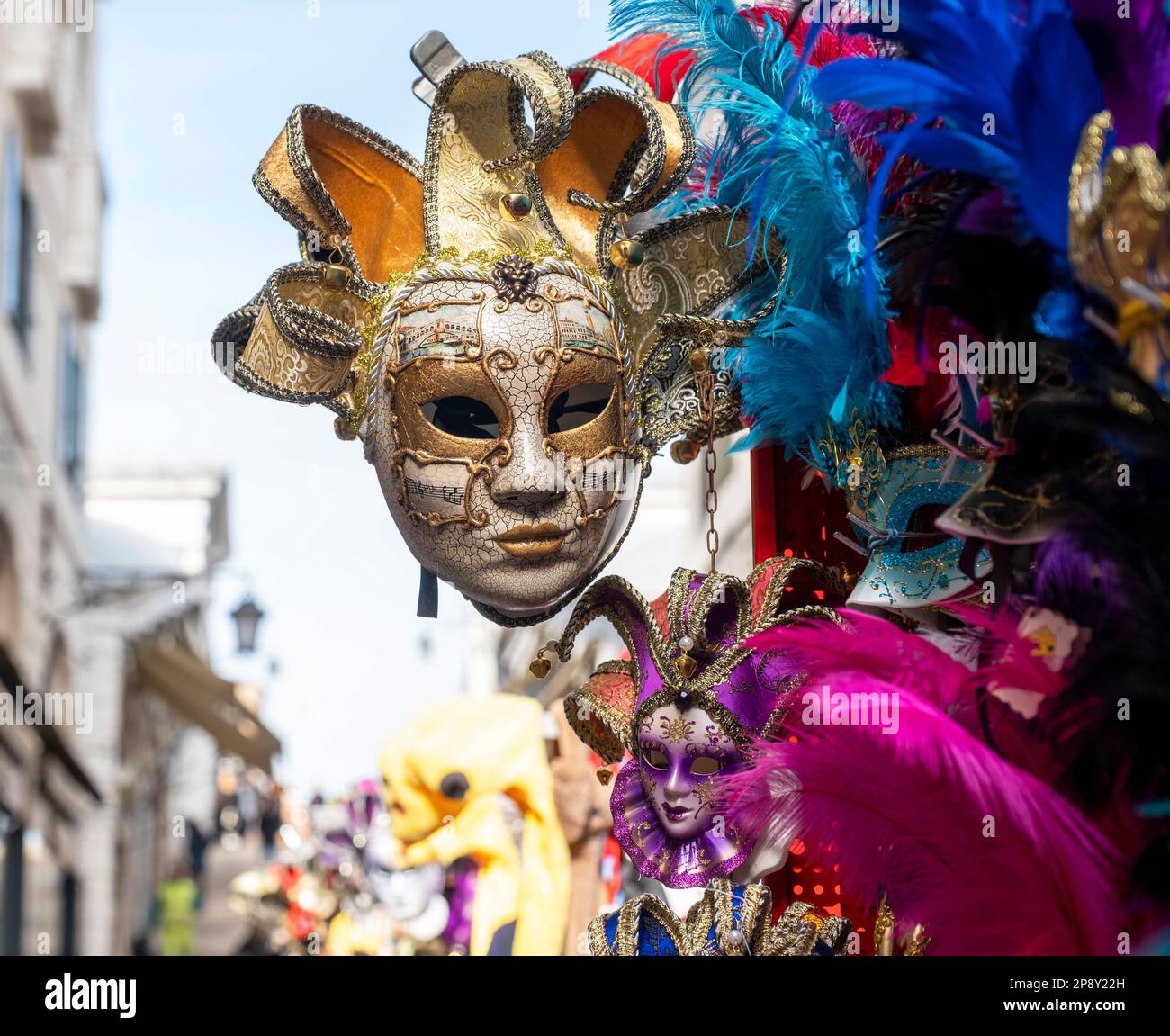 Face masks on display on a street venders stall, Venice, Italy. Stock Photo