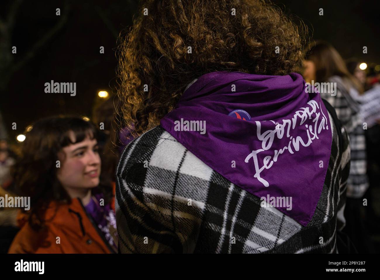 Pamplona, Spain. 08th Mar, 2023. A woman with a scarf on her back with the slogan 'Gora Borroka Feminista', which means 'up in the feminist fight' during the demonstration. March for International Women's Day in the city of Pamplona, Spain. (Photo by Nacho Boullosa/SOPA Images/Sipa USA) Credit: Sipa USA/Alamy Live News Stock Photo
