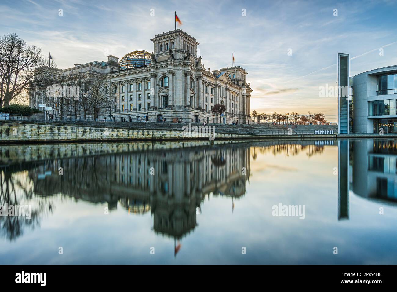 Government district in Berlin. Parliament and government buildings in the capital of Germany. Reflection on the water surface of the river Spree. Stock Photo