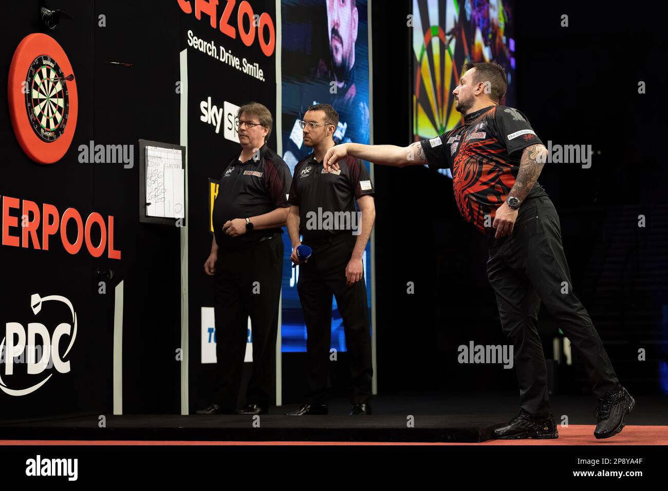 Jonny Clayton throws a dart during the 2023 Cazoo PDC Premier League