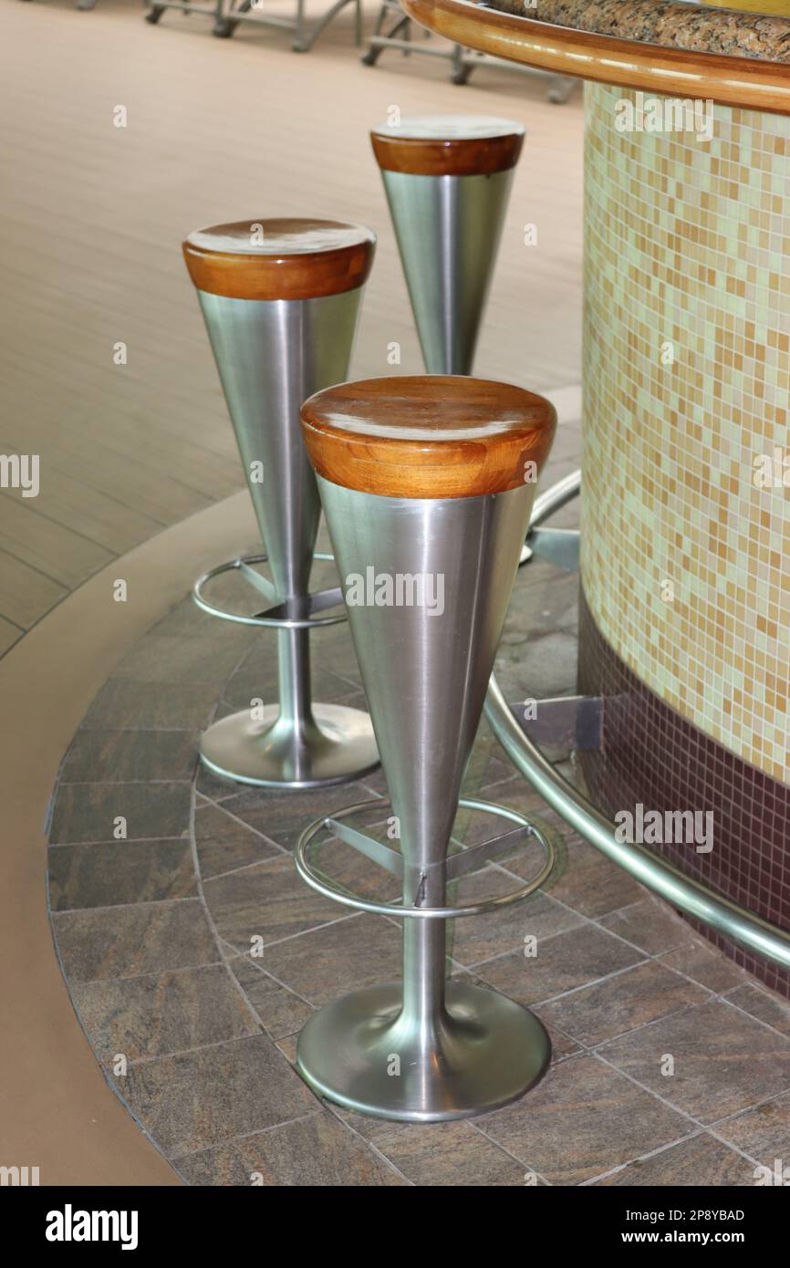 Stylish conical stainless steel bar stools used at all the pool bar