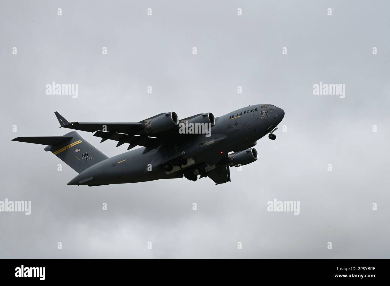 A C-17 Globemaster III assigned to the 535th Airlift Squadron, Joint Base Pearl Harbor-Hickam, Hawaii, launches from Tinian International Airport, Northern Mariana Islands, after Exercise Agile Reaper 23-1, March 8, 2023. AR 23-1 is the 3rd Air Expeditionary Wing’s effort to exercise Agile Combat Employment, rehearse capabilities in an operationally relevant environment and to provide air dominance, global mobility and command and control in the Indo-Pacific region. Some of the outcomes of the exercise included an ACE handbook to be used to define future ACE operations, strengthened ACE and Mu Stock Photo