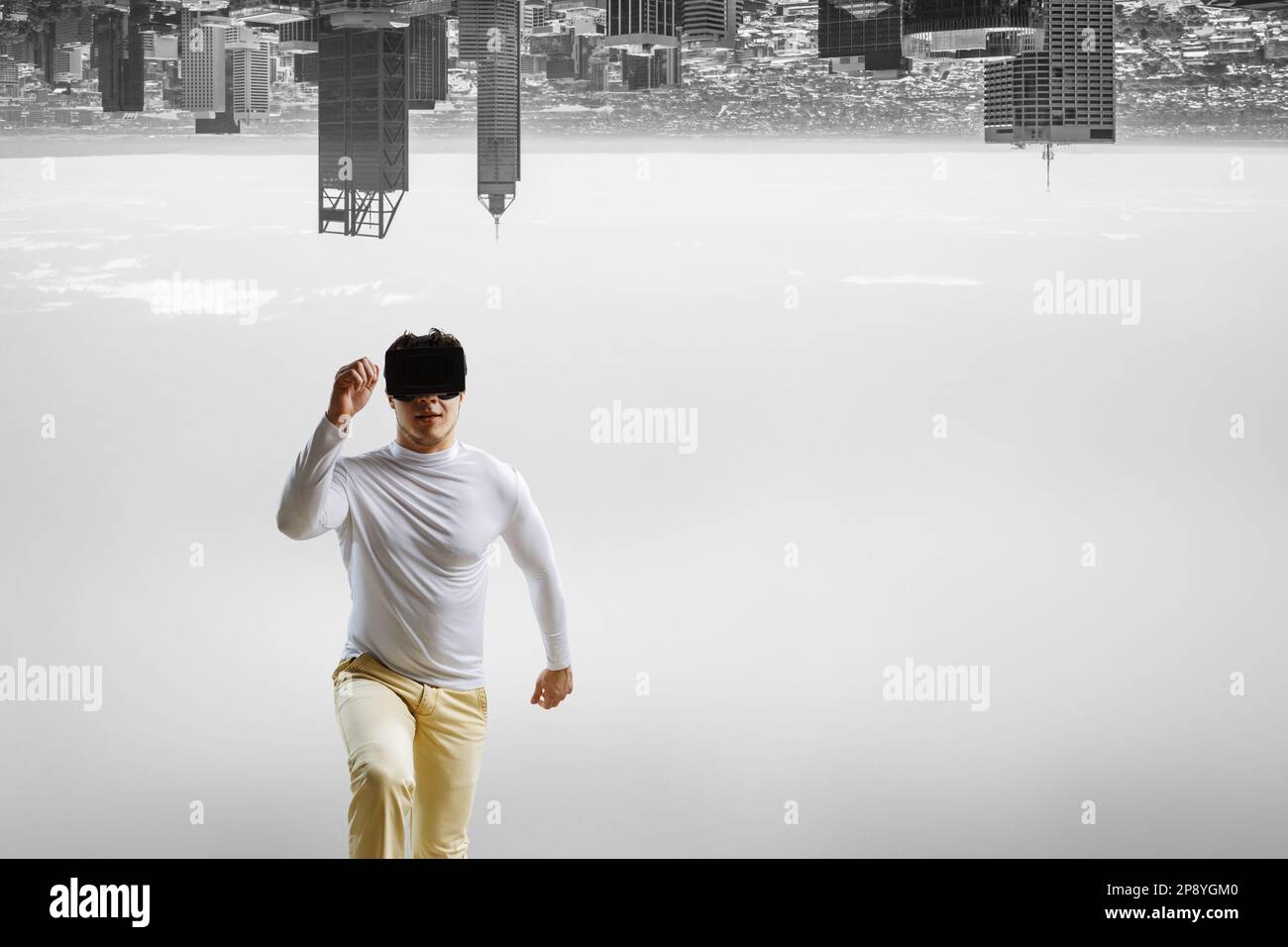 Man wearing virtual reality goggles Stock Photo - Alamy