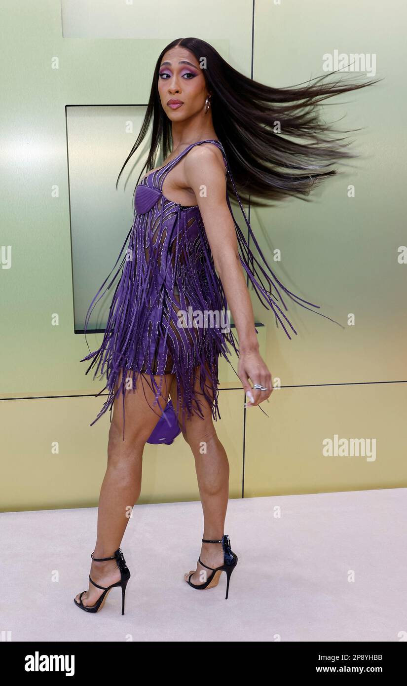 Michaela Jae Rodriguez poses before the Versace Fall-Winter 2023