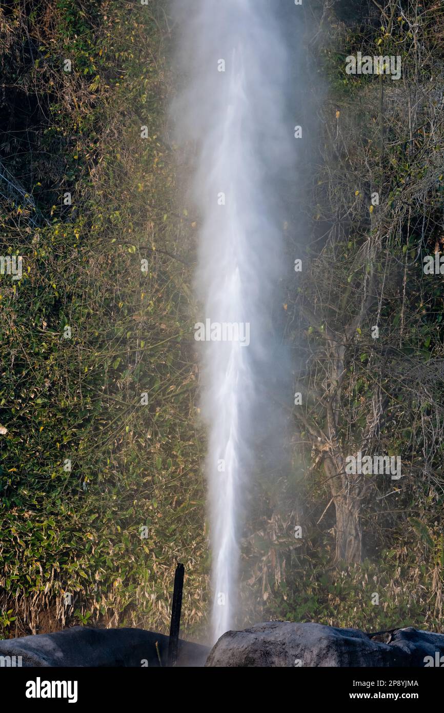 Eruption of a geyser at Fang Hot Spring, Doi Pha Hom Pok National Park, Chiang Mai, Thailand. Stock Photo
