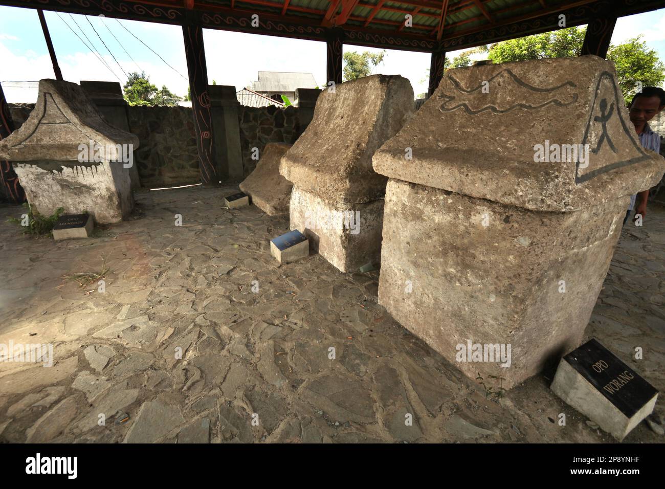 A location where five sarcophaguses are placed in Tomohon, North Sulawesi, Indonesia. Locally called the 'Waruga Opo Worang', the small complex consists of tombs of at least five ancestors of the present-day Minahasa clans. Stock Photo
