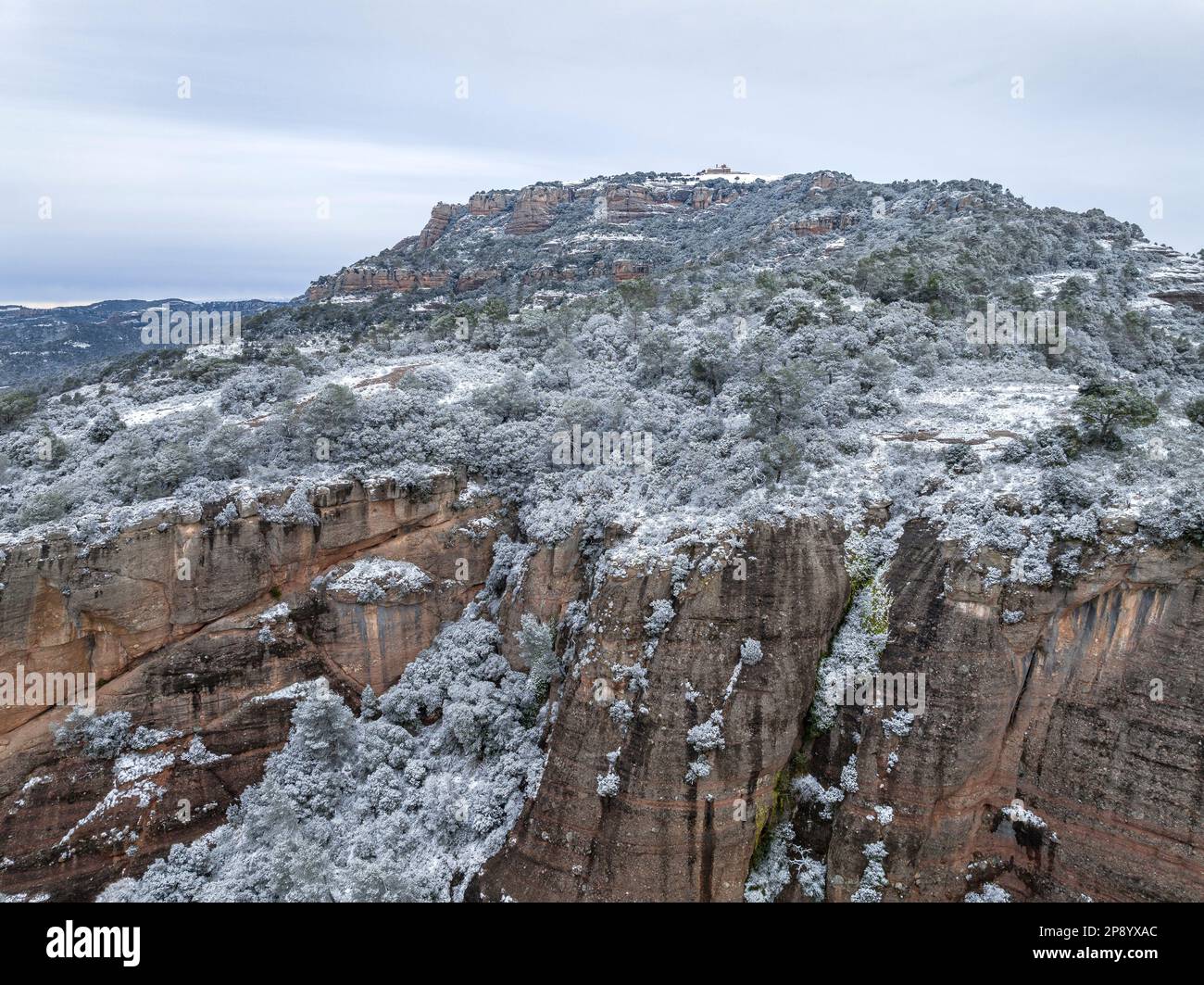 Aerial view of the snow-capped Mola mountain after the snowfall on 02-27-2023 (Matadepera, Vallès Occidental, Barcelona, Catalonia, Spain) Stock Photo