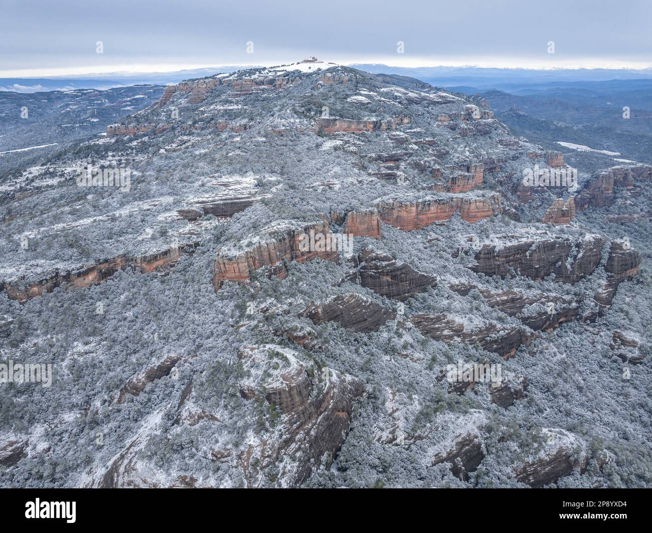 Aerial view of the snow-capped Mola mountain after the snowfall on 02-27-2023 (Matadepera, Vallès Occidental, Barcelona, Catalonia, Spain) Stock Photo
